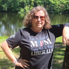 A proud mom sporting our Just A Regular Mom T-Shirt.