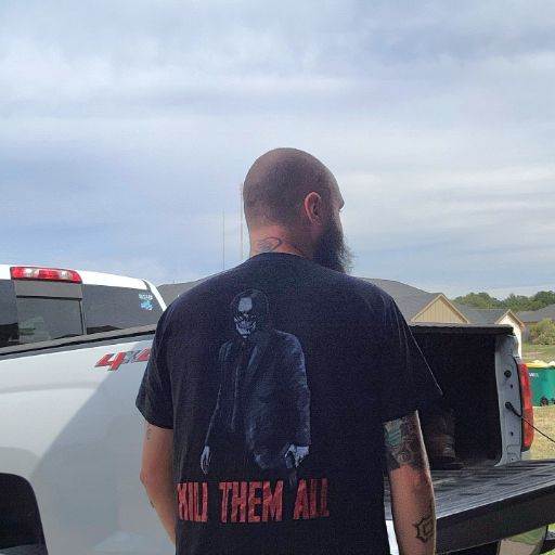 A proud warrior sporting our Kill Them All T-Shirt.