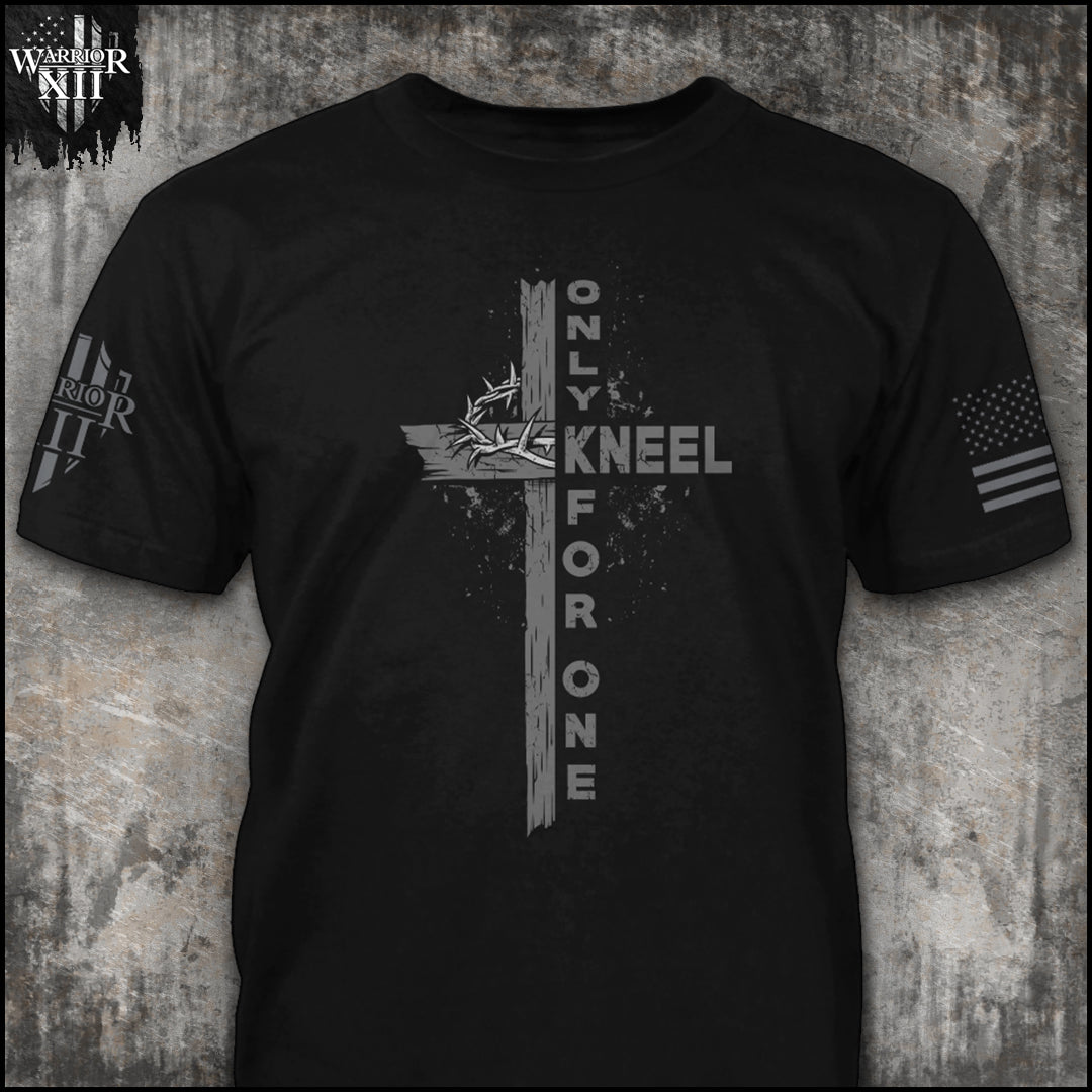 "Only Kneel For One 2.0" is printed on a Black t-shirt with the main design printed on the the front and the back of this t-shirt has no printing. This shirt features our brand logo on the right sleeve and the American Flag on the left sleeve.