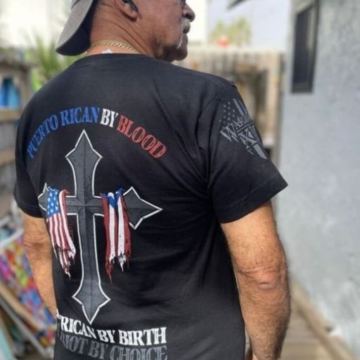 A true warrior sporting our Puerto Rican By Blood T-Shirt.