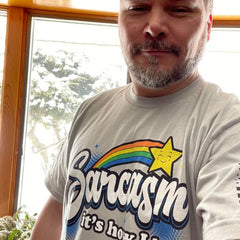 A proud warrior sporting our Sarcasm - It's How I Hug T-Shirt.