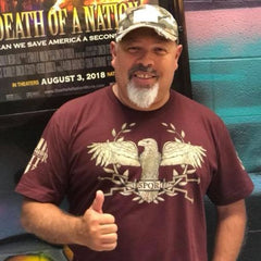 Verified Warrior having a night out while representing his new SPQR t-shirt.
