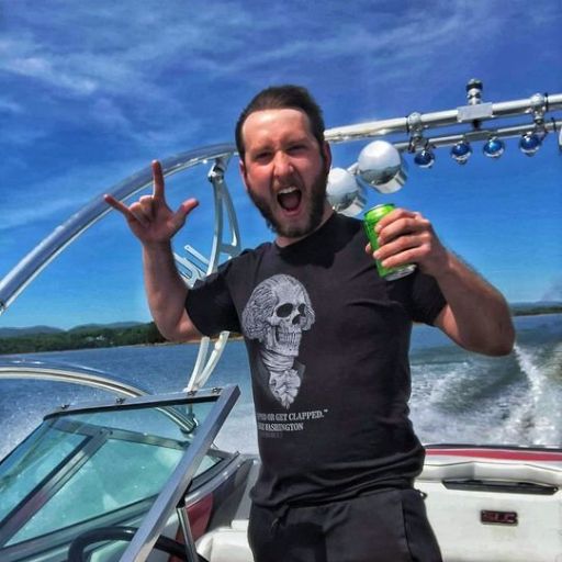 Verified Warrior representing his new Stay Strapped Or Get Clapped t-shirt while enjoying a day out on the lake. 