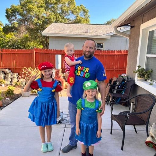 Verified Super Dad representing his new Super Daddio t-shirt.