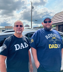 Two of our customers having a day out while wearing our Dad Defined and Armed and Dadly t-shirts. 
