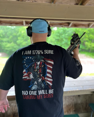 Happy customer showing off his 1776% Sure t-shirt at the range!