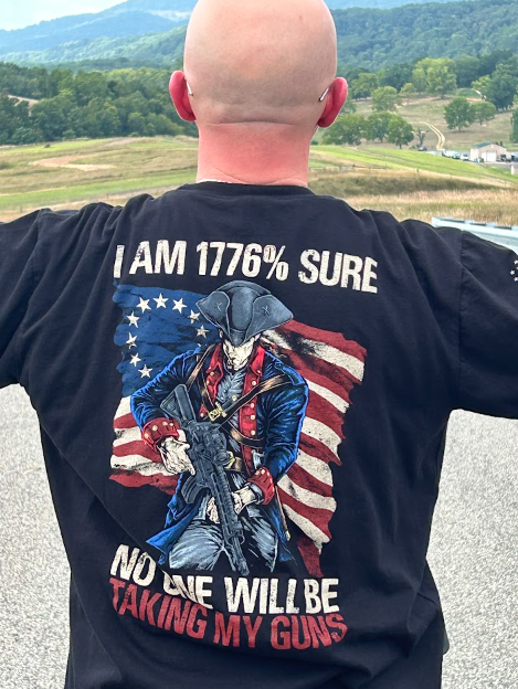 Happy customer showing off his 1776% Sure t-shirt.