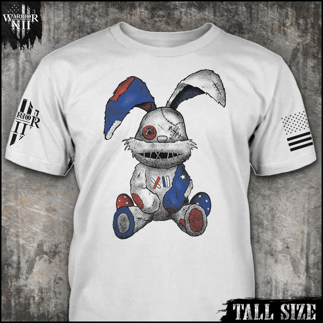 "Stitched Bunny - Tall Size" is printed on a white t-shirt with the main design printed on the the front and the back of this t-shirt has no printing. This shirt features our brand logo on the right sleeve and the American Flag on the left sleeve.