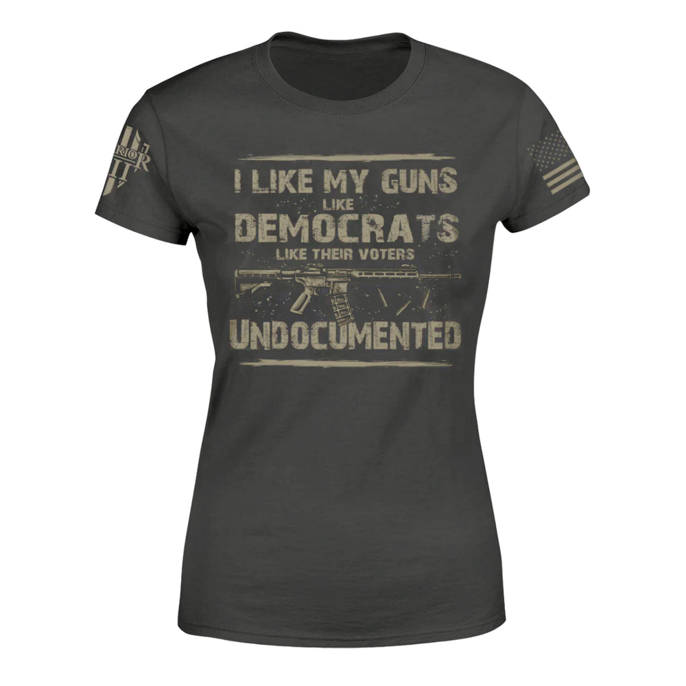 An asphalt-gray t-shirt which has a design on the front "I like my guns like democrats like their voters: undocumented," with an AR-15 rifle.