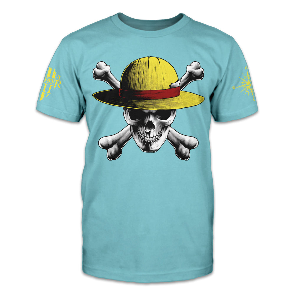 Light blue shirt with a front print design of a white skull and crossbones with a yellow safari hat.