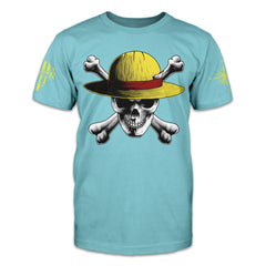 Light blue shirt with a front print design of a white skull and crossbones with a yellow safari hat.