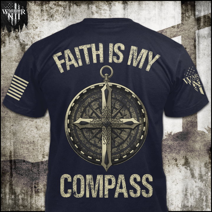 A navy blue t-shirt with an image on the back of a compass with a Christian Cross on it with the words "Faith is my Compass", and a small pocket image on the front of a cross.