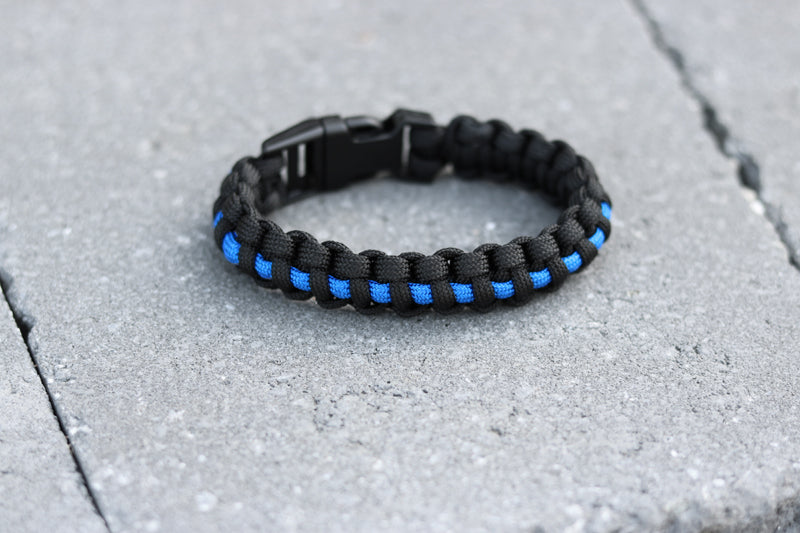 GT Distributors  Rothco Blue Line Paracord Bracelet httpsbitly3bx8KsT  Show your support for our police and law enforcement with Rothcos Deluxe  Thin Blue Line Paracord Bracelet The ultimate paracord survival bracelet  features