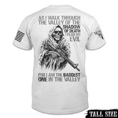 A white Baddest In The Valley tall sized t-shirt with the words" As I walk through the valley of the shadow of death, I fear no evil, for I am the baddest one in the valley", printed on the back.