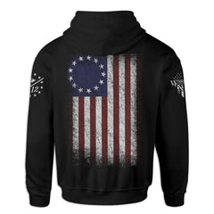 A black hoodie with the Betsy Ross flag printed on the back.