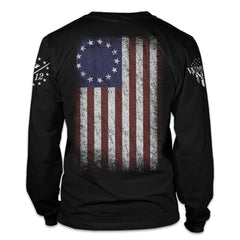 A black long sleeve shirt with the Betsy Ross flag printed on the back.