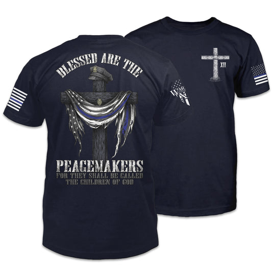 Front & back blue Blessed Are The Peacemakers t-shirt with the cross, a police hat, and the back the blue flag printed on the shirt.