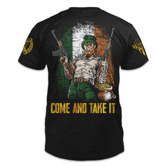 A black t-shirt with the words "Come and take it" with an Irish man holding two guns in front of an Irish flag printed on the back of theshirt.