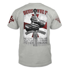 A white t-shirt with a design that is an iconic representation of the crusaders that invokes the spirit of the warriors of Christ. The design of the hands around the sword is printed on the back.