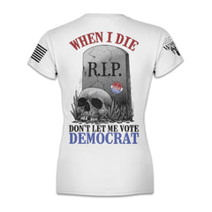A white women's relaxed t-shirt with the words "When I die, don't let me vote Democrat" with a gravestone and a skull printed on the back of the shirt.