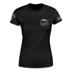 A black women's relaxed t-shirt with a skull printed on the front.