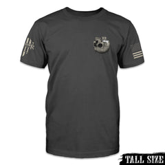 An asphalt grey t-shirt featuring a graphic on the back with upside-down skull with a foamy beverage coming out of the skull, being held by a skeletal hand and the words "Drink with your enemies."