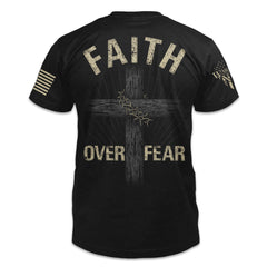 A black t-shirt with the words "Faith Over Fear" with a cross printed on the back of the shirt.