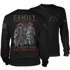Front & back black long sleeve shirt with the words "Family is not about blood, it's about who has your back" with a two western cowboys printed on the shirt.