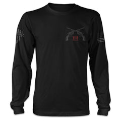 A black long sleeve shirt with two pistols crossed over with the roman numerals XII printed on the front of the shirt.