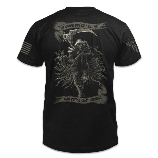A black t-shirt with the words "That Which Doesn't Kill Me Had Better Start Running" with a Reaper holding an AR-15 printed on the back of the shirt.