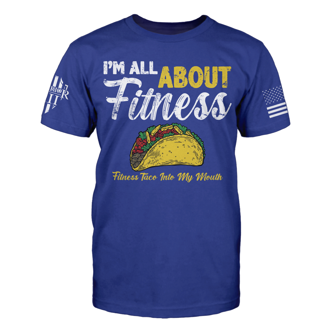 A blue t-shirt with the words 'I'm all about fitness - fitness taco into my mouth" printed on the front. The back of the shirt has no printing.