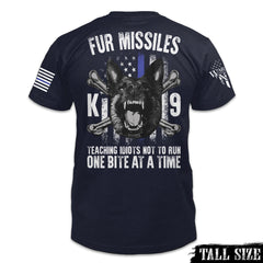 A navy blue tall size shirt with the words "Fur Missiles, Teaching Idiots Not To Run, One Bite At A Time!" featuring a german shepherd showing teeth in front of a thin blue line USA flag printed on the back of the shirt.