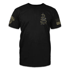 A black t-shirt with a coiled rattlesnake on an AR15 printed on the front of the shirt.