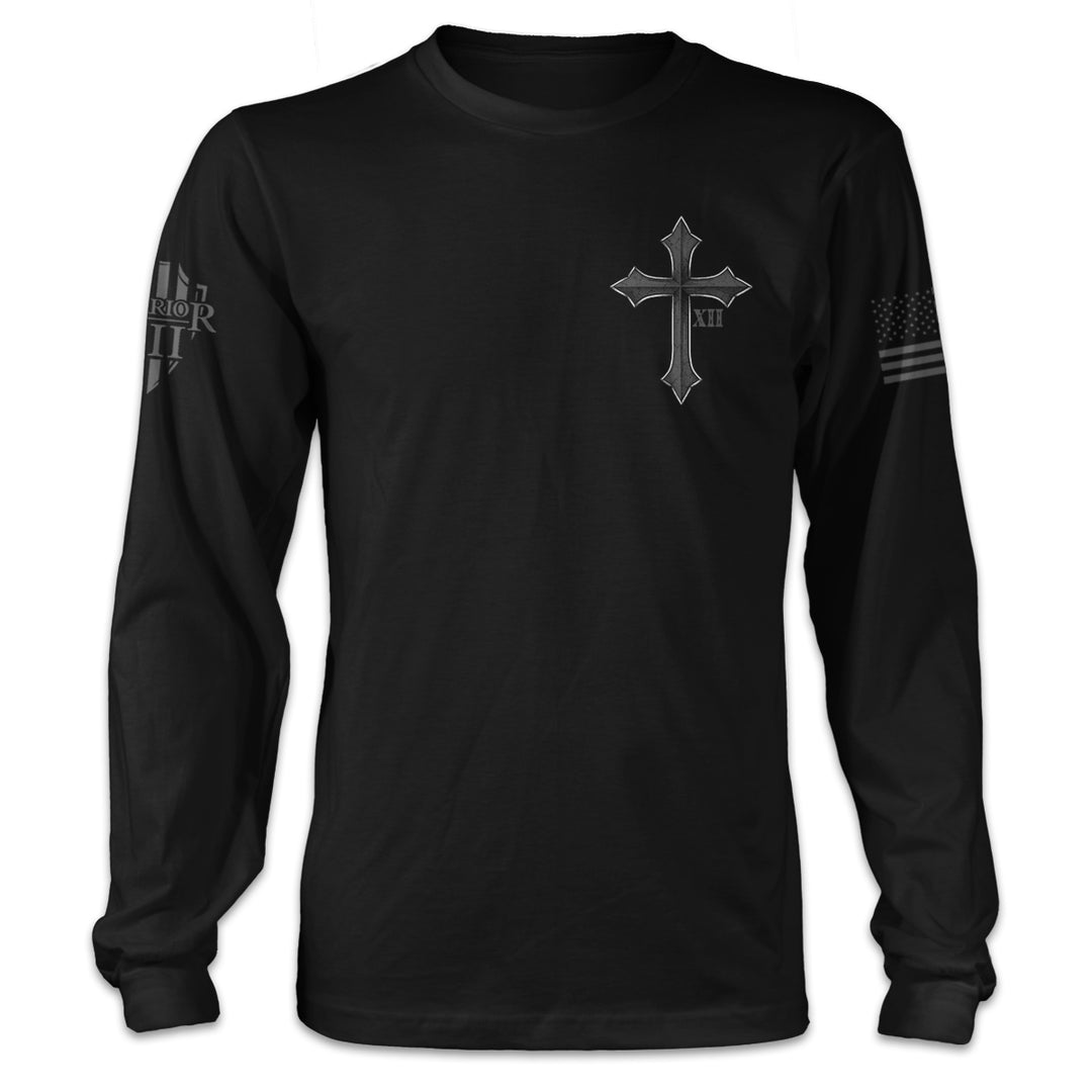 A black long sleeve shirt with a cross and roman numerals XII printed on the front of the shirt.