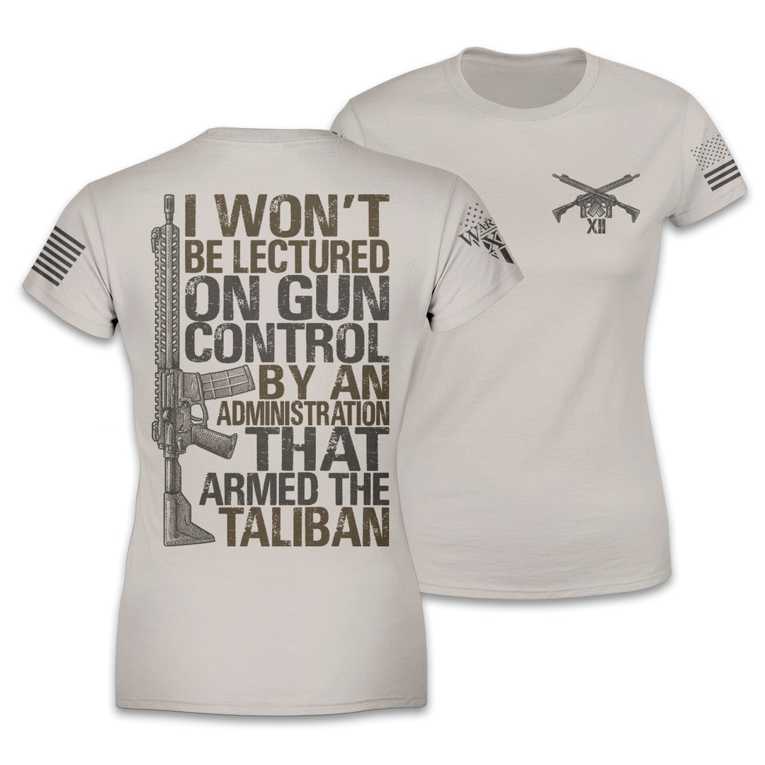 Front & back light tan women's relaxed fit'shirt with the words 'I won't be lectured on gun control by an administration that armed the Taliban" with an AR15 printed on the shirt.