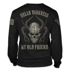 A black long sleeve shirt with the words "Hello darkness my old friend" with a skull and horns printed on the back of the  shirt.