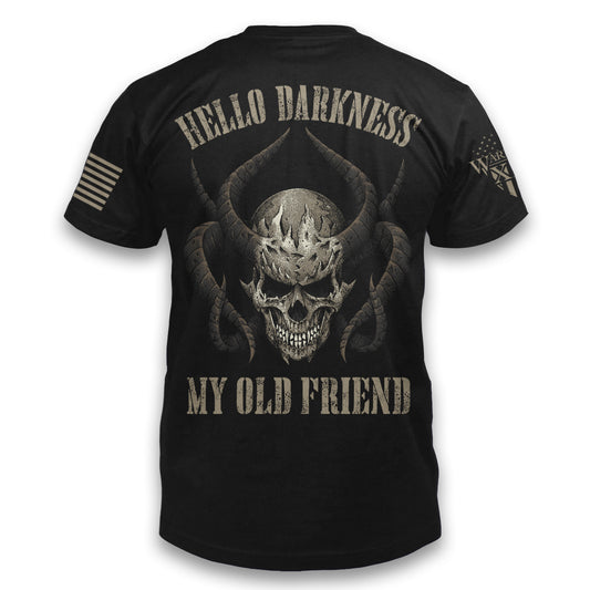 A black t-shirt with the words "Hello darkness my old friend" with a skull and horns printed on the back of the  shirt.