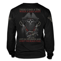 A black long sleeve shirt with the words "There comes a time when a man must spit on his hands and hoist the black flag" with the skull of blackbeard printed on the back of the shirt.