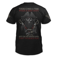 A black t-shirt with the words "There comes a time when a man must spit on his hands and hoist the black flag" with the skull of blackbeard printed on the back of the shirt.