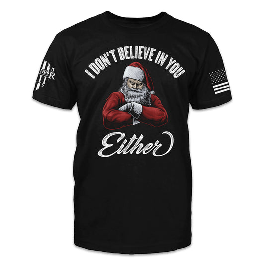 A black t-shirt with the words "I don't believe in you either" and a crossed arm Santa Claus printed on the front.