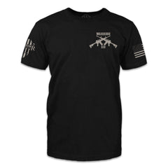 The front of a black t-shirt with two guns crossed over and the words "Warrior XII".
