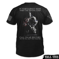 A black tall size shirt with the words "In your darkest hour when the demons come, call on me, brother, and we will fight them together" with a soldier printed on the back of the shirt.