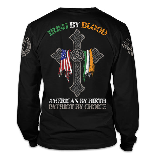 A black long sleeve shirt with the words "Irish by blood, American by birth, patriot by choice" with a cross holding an American and Irish flag printed on the back of the shirt.