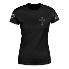 A black women's relaxed fit shirt with a cross with XII printed on the front.