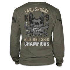 A olive green long sleeve shirt with the words "land shark" and a the skeleton of k9 police dog printed on the back of the shirt.