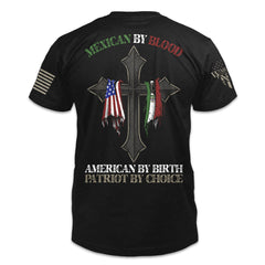 A black t-shirt with the words "Mexican by blood, American by birth, patriot by choice" with a cross holding the American and Mexican flag printed on the back of the  shirt. 