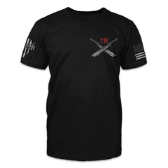 Two machetes printed on the front of a black t-shirt.
