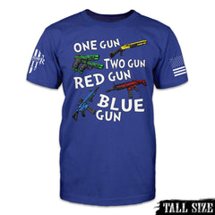 A blue tall size shirt with the words "One gun, two gun, red gun blue gun" with colored guns printed on the front.