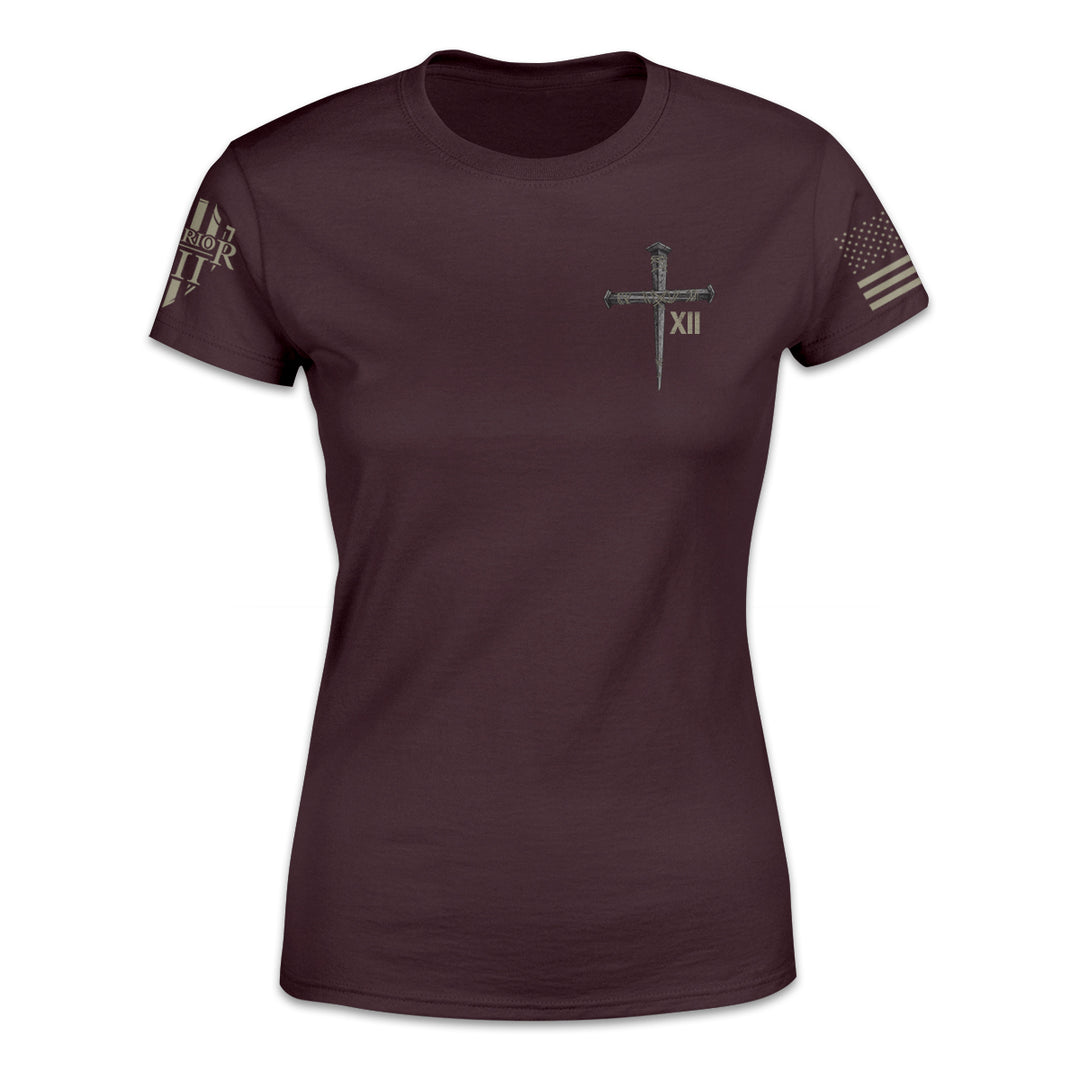 A burgundy women's relaxed fit'shirt with a cross printed on the front.