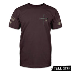 A burgundy tall size shirt with a cross printed on the front.